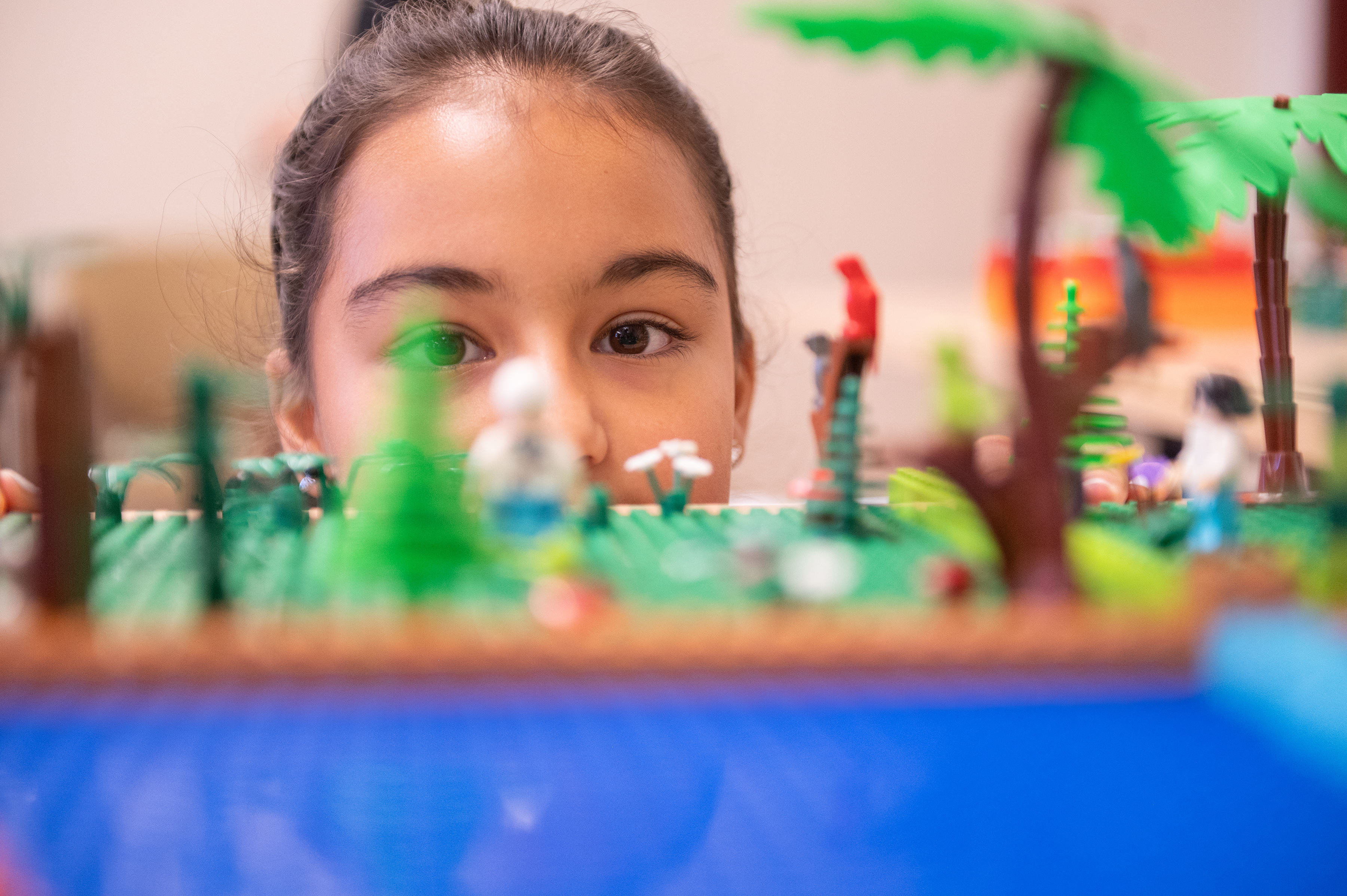  Khloe Gonzales examines her Lego build. New Mexico State University’s STEM Outreach Center hosted more than 250 students in fourth through eighth grades from throughout Doña Ana County during the center’s 2024 summer camps. (NMSU photo by Josh Bachman)